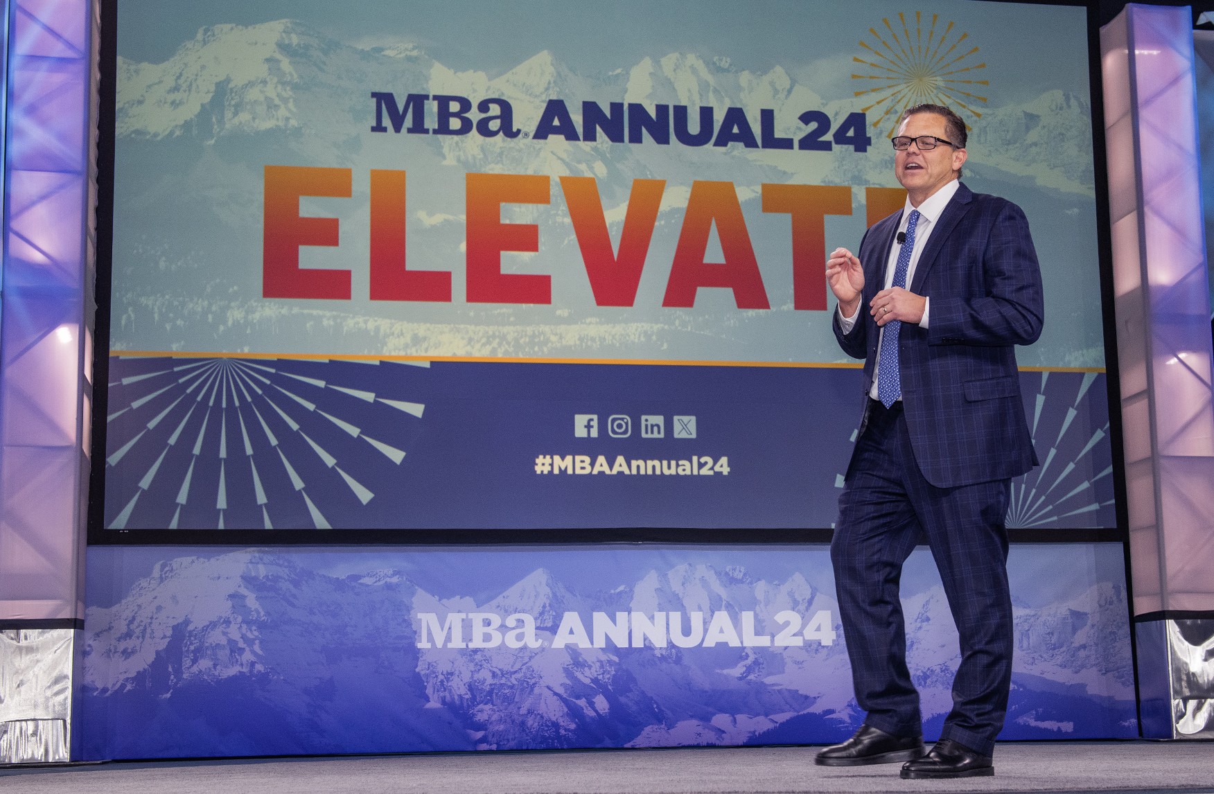 Owen Lee speaking on stage at the MBA Annual 2024 conference